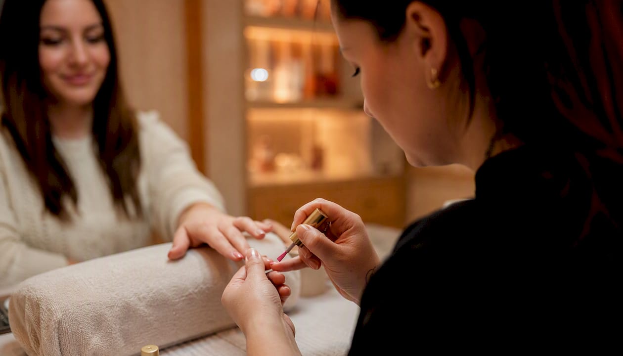 Gel manicure application at Foxy Nails salon Reno