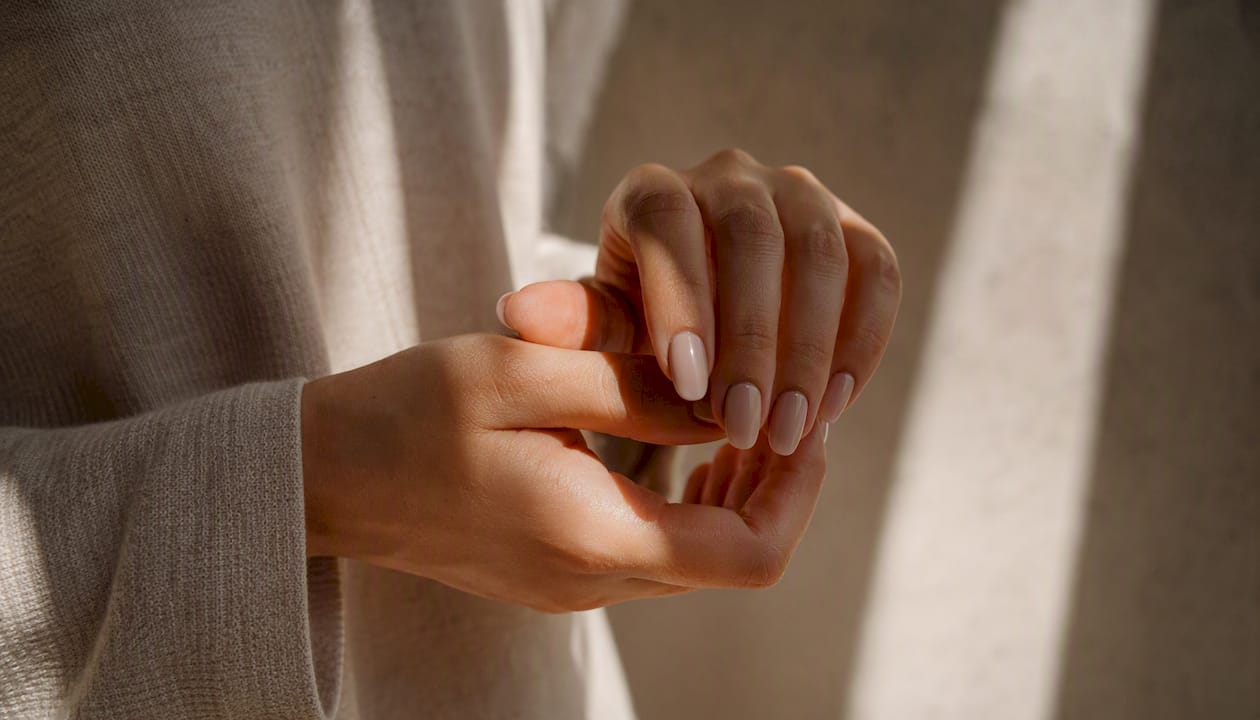 Short squoval and almond acrylic nails top-down