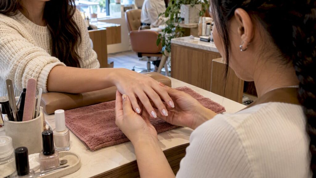 Fresh glazed donut manicure at salon